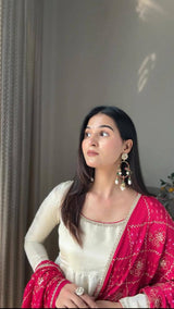 Add elegance to your festive look with this Exclusive 3 Piece Gown Pair crafted in luxurious Chinon fabric. Adorned with golden lace and fine piping