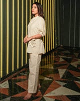 Crafted from premium Vatican fabric, this ensemble features delicate handwork