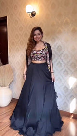 Full front view of the elegant Black Organza Choli Dhoti Set, showcasing intricate embroidery.
