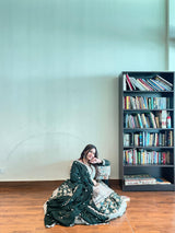 Faux Blooming gown with Zari Jacquard embroidery, pan neck, full sleeves, and flowing silhouette."
