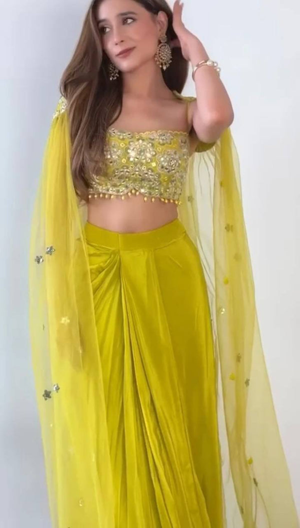 Stunning designer dhoti set with embroidered shrug and draped silhouette
