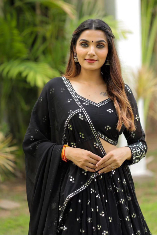 Step into the spotlight with this dazzling black sequin lehenga choli set