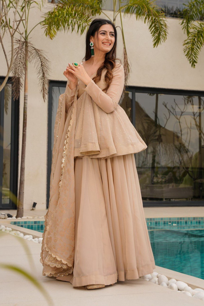 Step into sheer elegance with our Tabby Organza Plazo Set