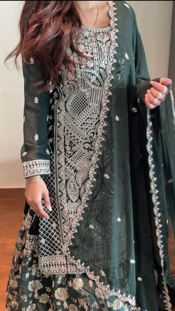  "Full view of Faux Blooming gown with Zari Jacquard embroidery, pan neck, full sleeves, and flowing silhouette."

