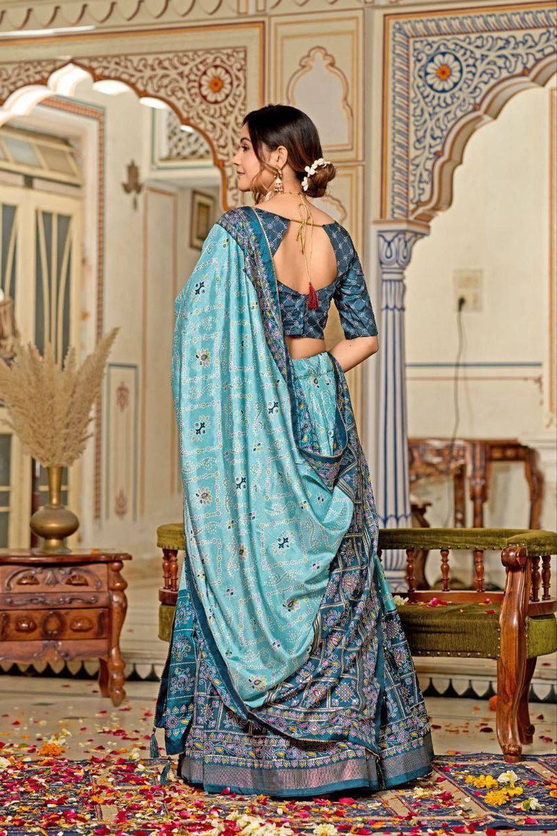 Indulge in the luxurious charm of Tussar Silk, where intricate Minakari designs meet the brilliance of foil print