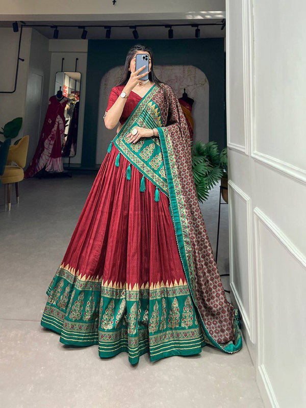 Step into luxury with this exquisite Tussar Silk Lehenga Set, beautifully adorned with Ikkat Patola prints and shimmering foil work.