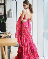 Crafted from premium Faux Georgette, this saree features digital print work, 2-layer ruffle detailing
