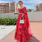 Crafted from premium Faux Georgette, this saree features digital print work, 2-layer ruffle detailing