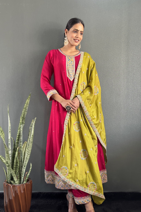 Stunning Vichitra Gown Set featuring exquisite embroidery work.